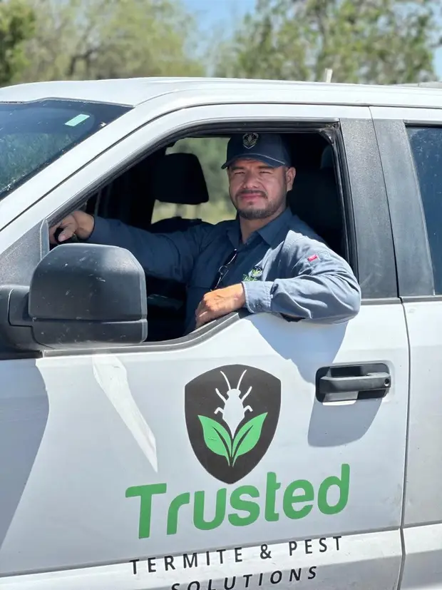 Valentin Moriel at the wheel of the Trusted Termite and Pest Solutions truck